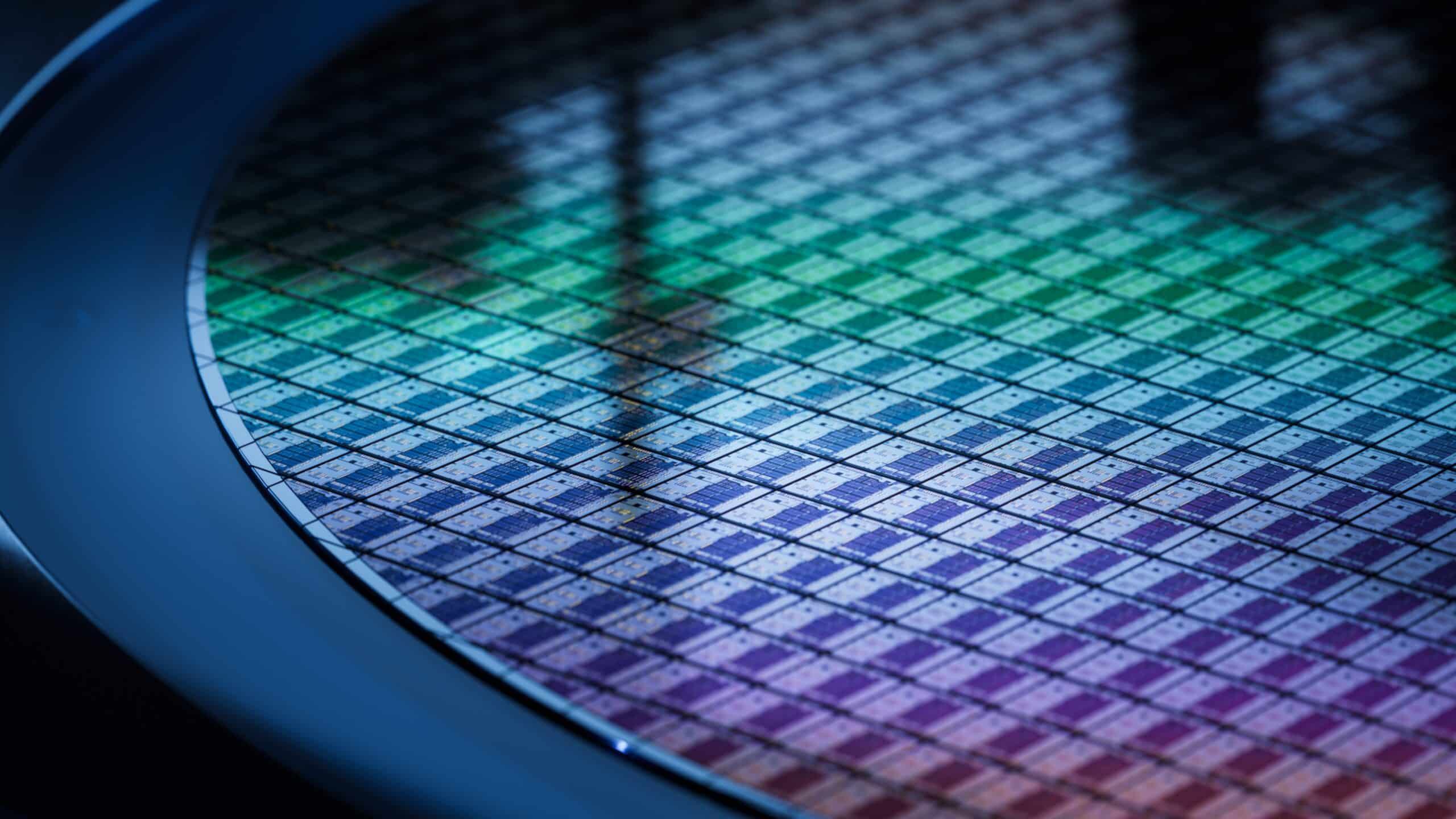 3d,render:,computer,chip,manufacturing.,close Up,of,colorful,semiconductor,wafer